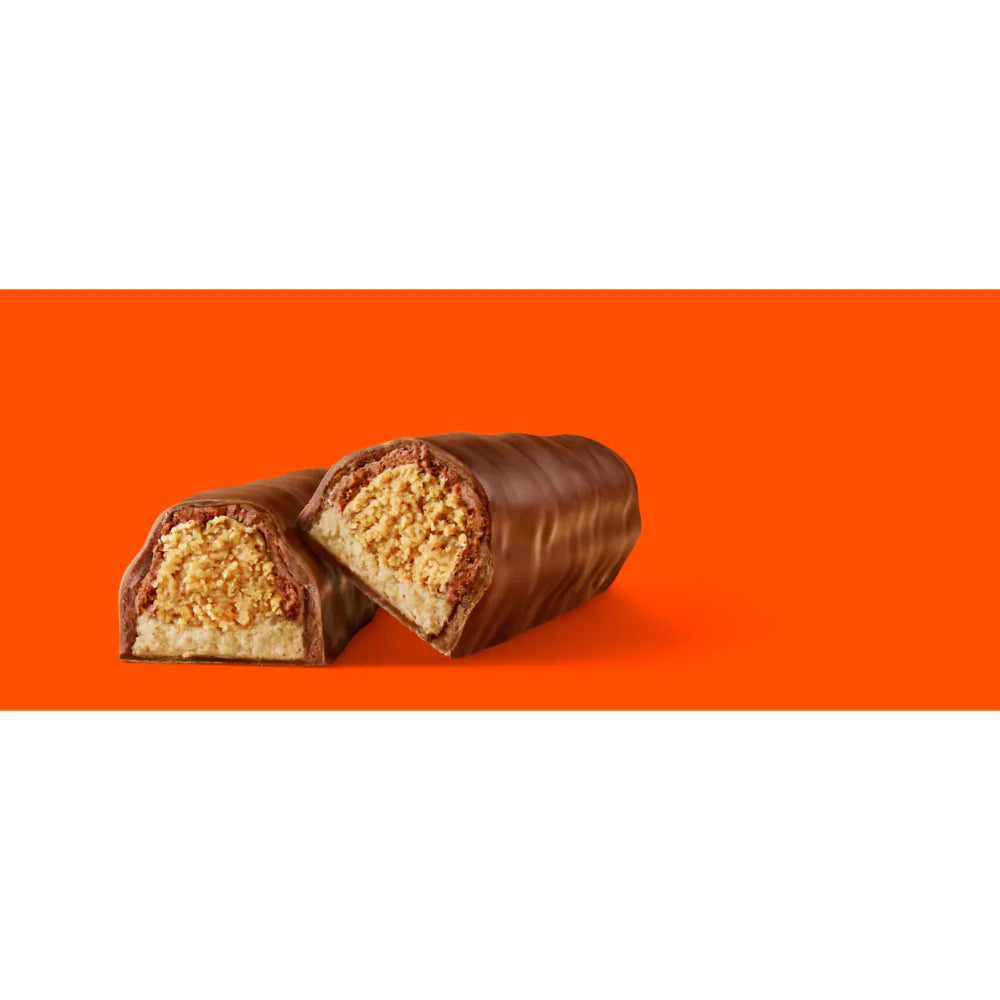 Reese's Fast Break King Size Bar (99g), featuring a creamy peanut butter and nougat center, coated in smooth milk chocolate.