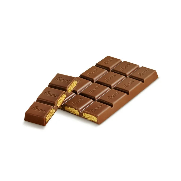 Unwrapped Reese’s Giant Bar showing thick peanut butter filling