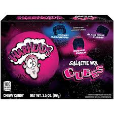 Warheads Galactic Theater Box with cosmic-themed packaging, featuring sour candies in bold, fruity flavours and a colorful design with stars and planets.