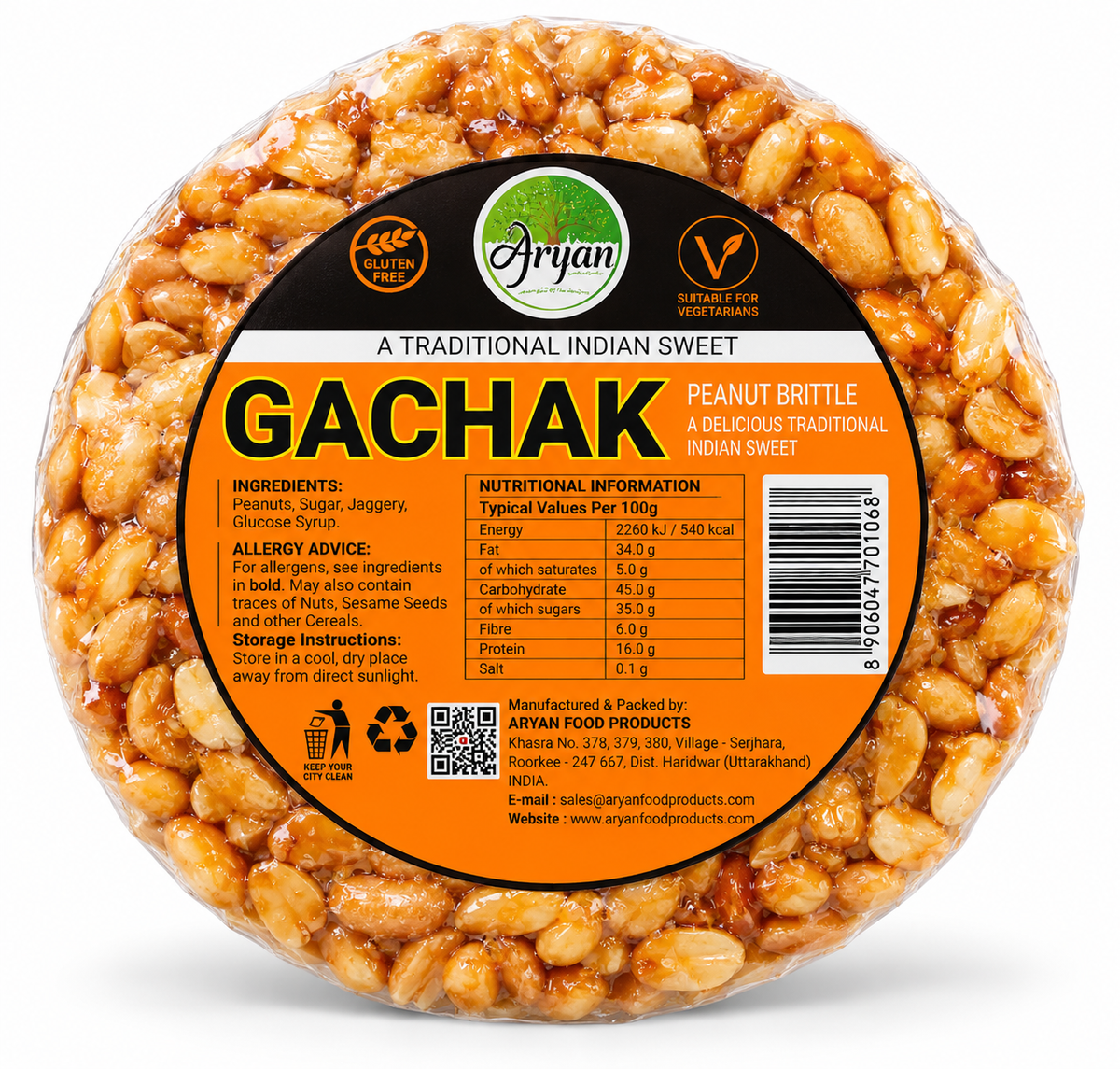 Aryan Gachak 200g traditional Indian peanut brittle featuring a round, peanut-studded sweet wrapped in clear plastic, with an orange and black label displaying Aryan branding.