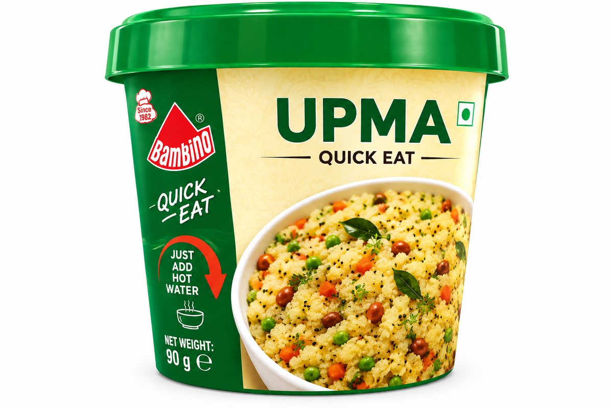 Bambino Quick Eat Upma 90g instant meal cup featuring green and cream packaging, a green lid, and an image of savoury upma with peas, carrots, peanuts, curry leaves, and spices.