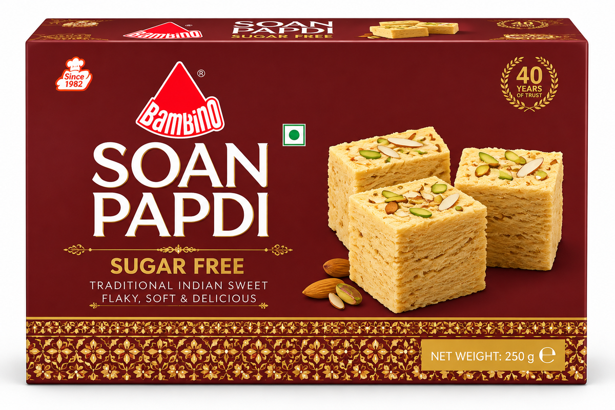 Bambino Soan Papdi Sugar Free 250g sweet box featuring maroon packaging with gold decorative patterns, flaky soan papdi cubes topped with almonds and pistachios, and Bambino branding.