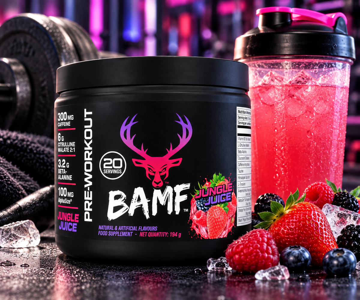 BAMF Pre-Workout Jungle Juice 194g tub with a pink shaker, fresh berries, and ice on a dramatic gym-inspired background.