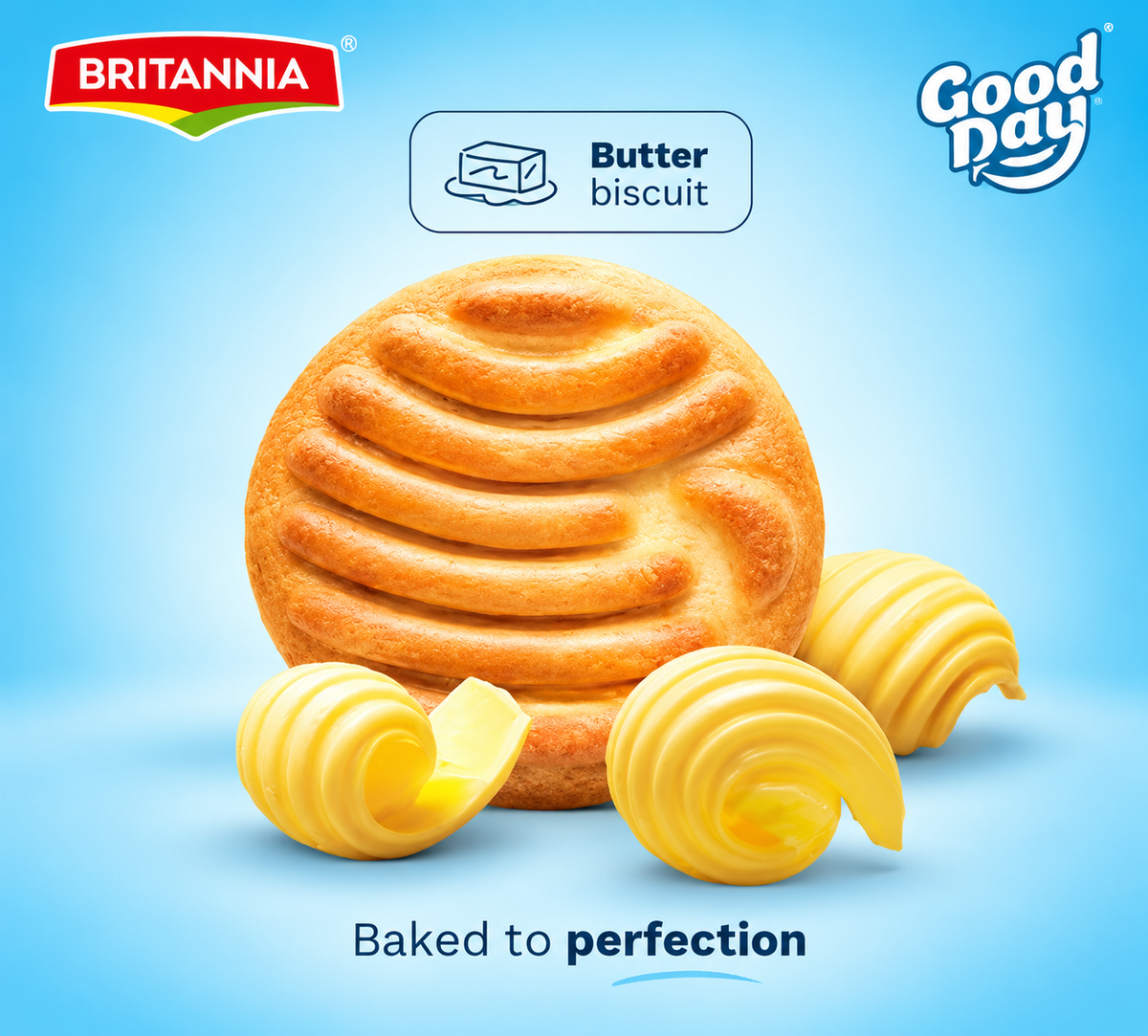 Golden Britannia Good Day-style butter biscuit with butter curls on a light blue background.