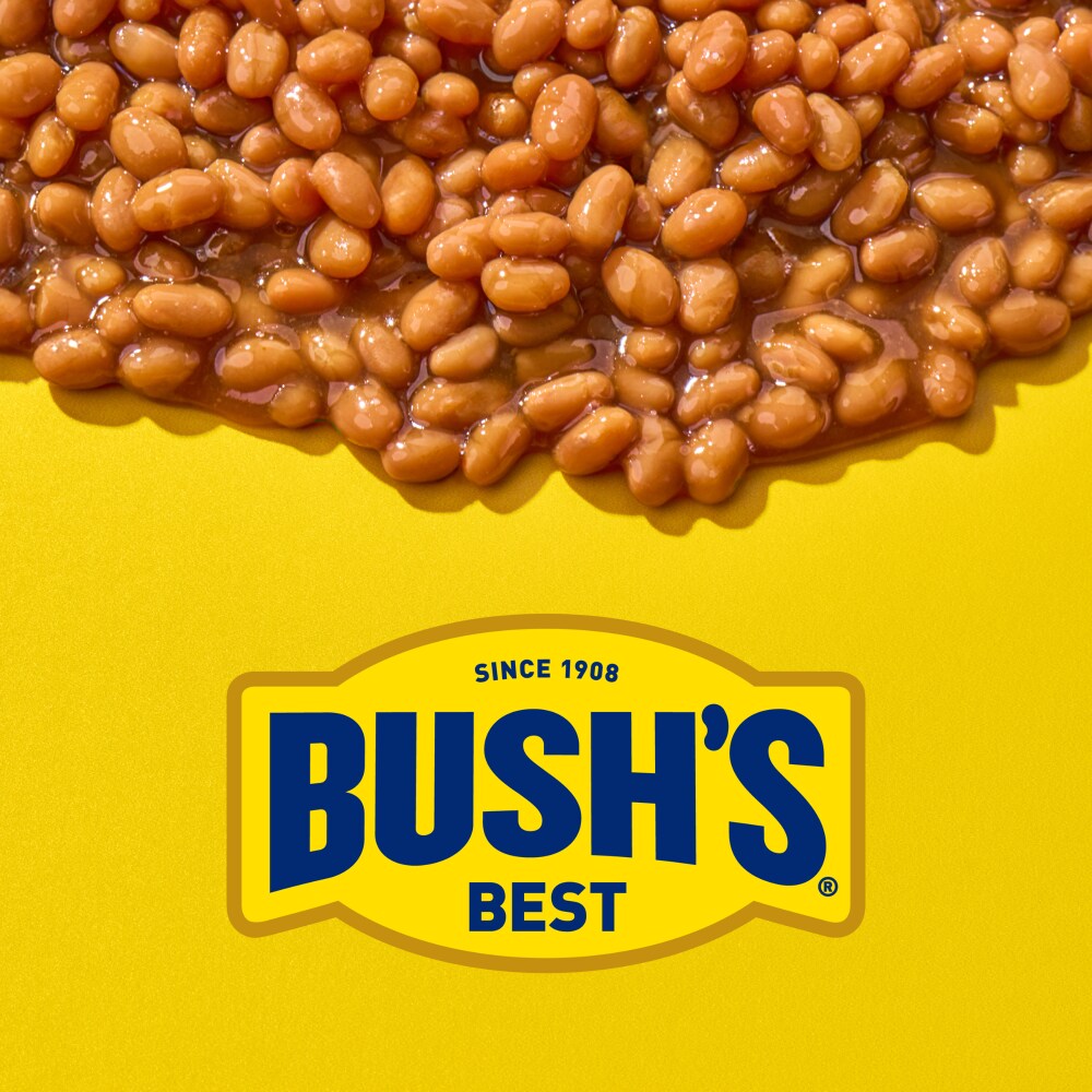 Opened can of Bush’s Best Original Baked Beans showing thick, rich sauce and beans.