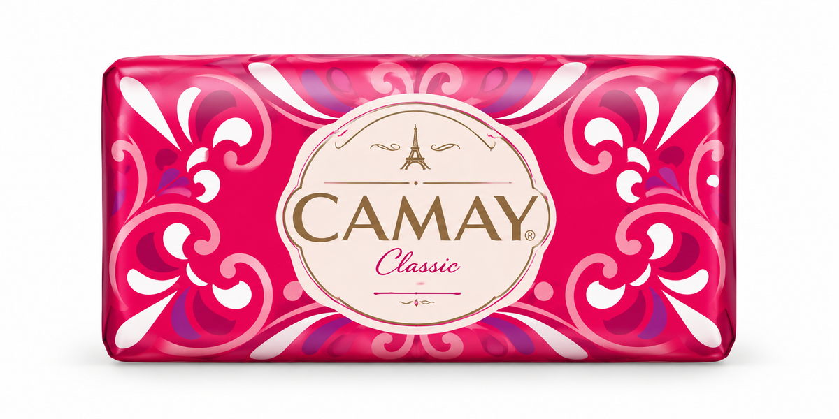 Camay Classic Soap 125g in glossy pink and red packaging with decorative white and purple floral patterns and a cream oval label with gold lettering, displayed on a clean white background.