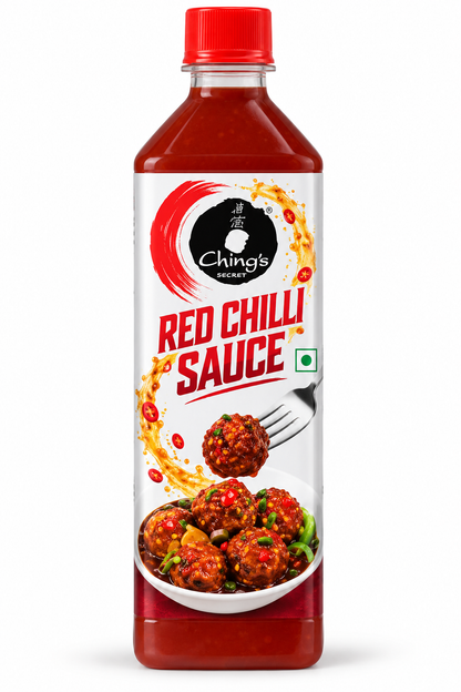 Ching’s Secret Red Chilli Sauce 680g bottle featuring a tall red-brown plastic container, a bright red screw cap, and a white label with the distinctive Ching’s Secret logo in black and red. The front label displays bold Red Chilli Sauce lettering, vibrant red chilli illustrations, sauce splash graphics, a green vegetarian symbol, and a serving image of glossy chilli-coated appetisers garnished with fresh herbs. Presented upright against a clean white background, showcasing spicy red chilli sauce.