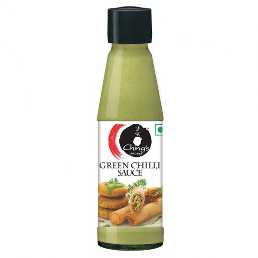 Ching’s Secret Green Chilli Sauce 190g glass bottle with green sauce and black cap, featuring spring rolls and snacks on the label.