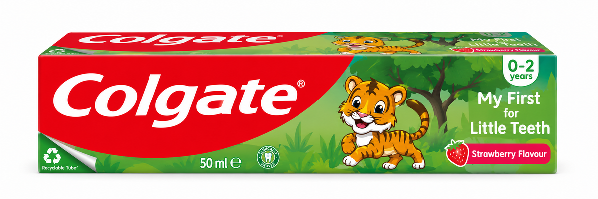 Colgate Junior My First for Little Teeth Strawberry Flavour Toothpaste 50ml in red and green packaging, featuring the white Colgate logo, a cartoon tiger, strawberry graphics, and age guidance for children aged 0–2 years against a clean white background.