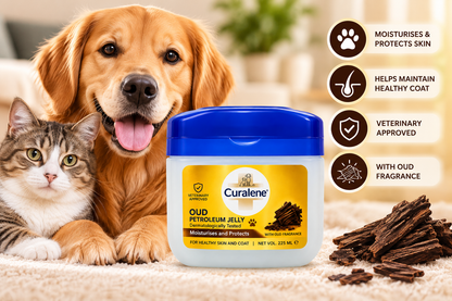 Curalene Oud Pet Jelly 225ml jar with blue lid and gold label displayed beside a golden retriever and tabby cat, with oud wood pieces and pet-care benefits highlighting skin moisturisation, coat care and oud fragrance.