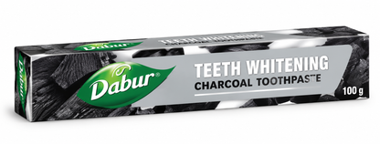 Dabur Teeth Whitening Charcoal Toothpaste 100g carton featuring black and gray charcoal-textured packaging, the green Dabur logo, prominent white “Teeth Whitening” lettering, and “Charcoal Toothpaste” text. The toothpaste box is displayed against a clean white background for a Shopify personal care product listing.
