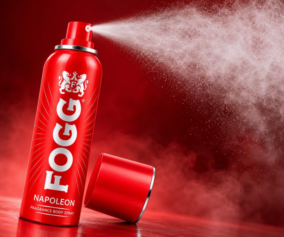 FOGG Napoleon red fragrance body spray releasing a fine mist, showcasing the Napoleon deodorant spray.