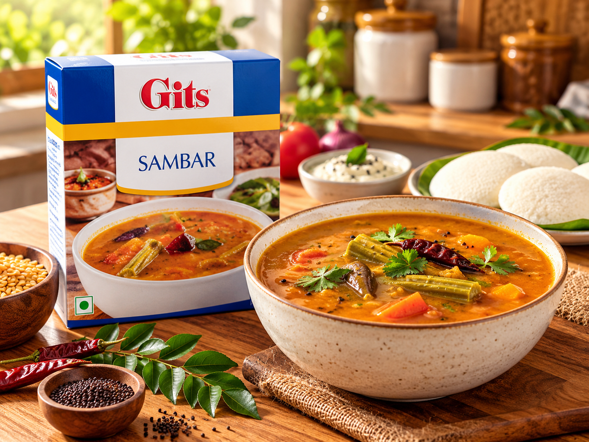 Gits Sambar 200g single pack served with a bowl of traditional South Indian sambar garnished with curry leaves and coriander, accompanied by soft idlis.