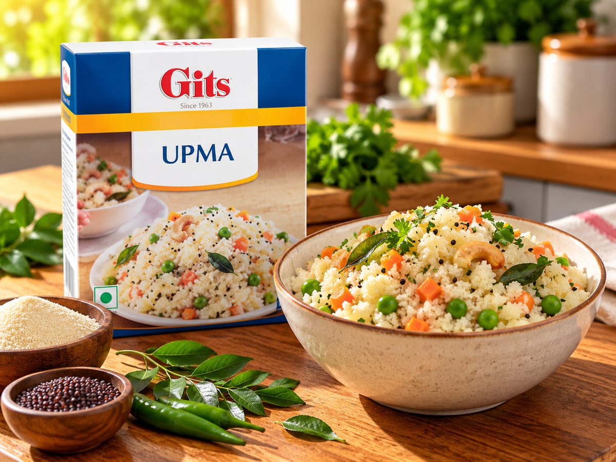 Gits Upma 200g single pack served with a bowl of vegetable upma garnished with cashews, curry leaves and fresh coriander.