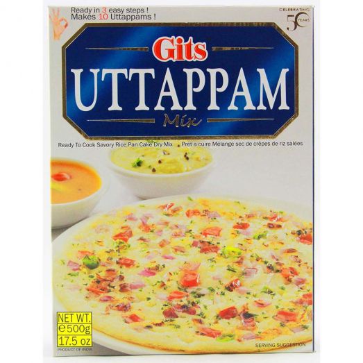 Gits Uttappam Mix 500g box packaging showing a large South Indian uttappam topped with onions, tomatoes, and herbs, served with bowls of sambar and chutney.