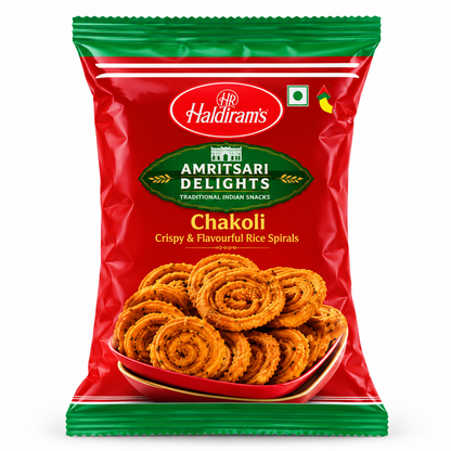 Haldiram Chakoli snack packet in red and green packaging, featuring golden, crispy spiral-shaped rice snacks on the front.