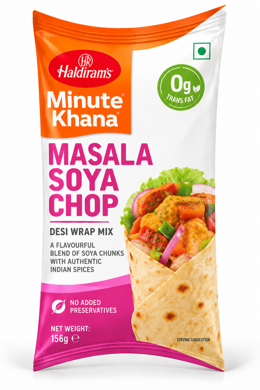 Haldiram’s Minute Khana Masala Soya Chop Desi Wrap Mix 156g pouch featuring orange, white and pink packaging, a tortilla wrap filled with spiced soya chunks, red and green peppers, sliced onions, fresh lettuce, and Haldiram’s branding.