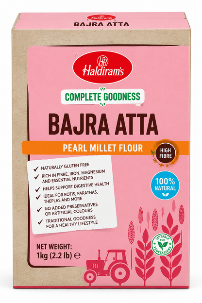 Haldiram’s Bajra Atta Pearl Millet Flour 1kg pack in pink and beige packaging, featuring the product name and millet illustrations.