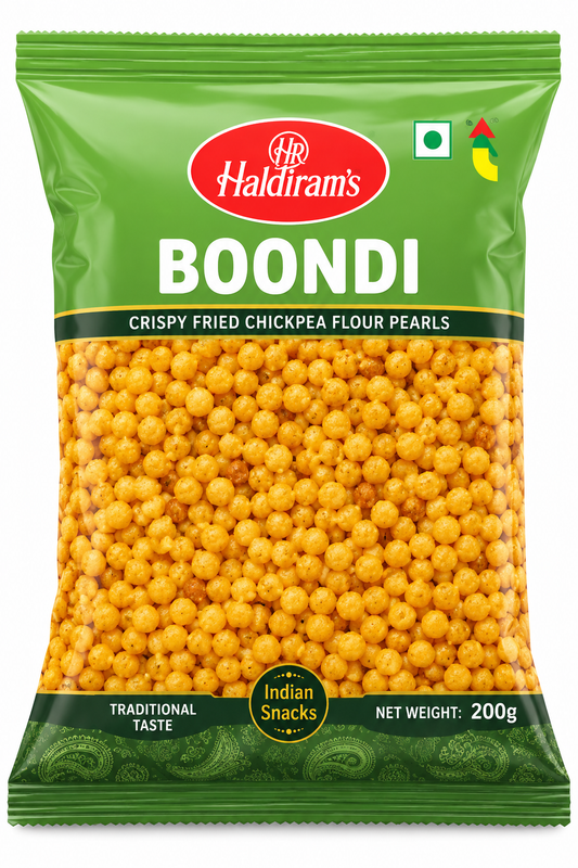 Haldiram’s Boondi snack packet in green packaging, showing small golden boondi pearls through the transparent front.