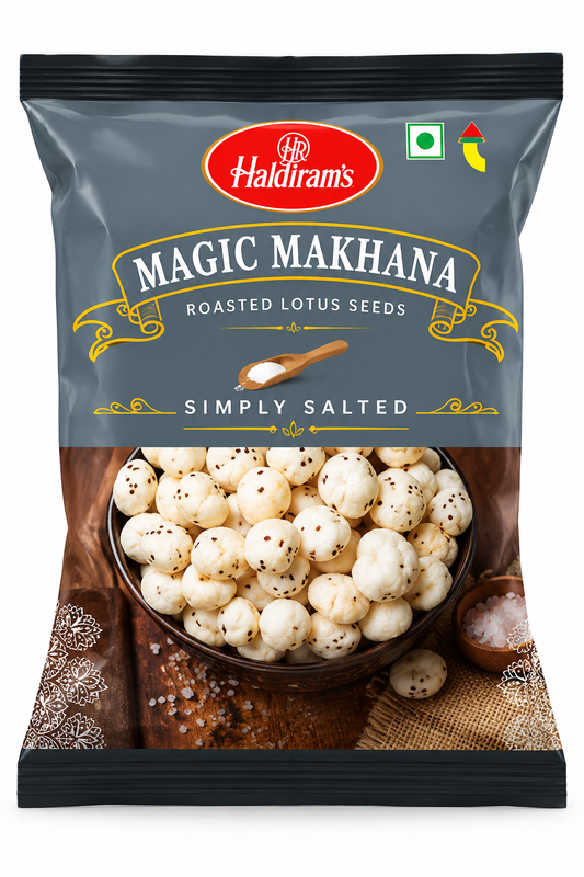 Haldiram’s Magic Makhana roasted fox nuts snack packet in dark grey packaging, showing white makhana pieces through a clear window.