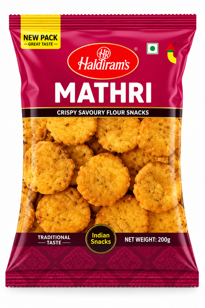 Haldiram’s Mathri savoury snack packet in magenta packaging, featuring golden, crispy, round crackers.