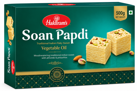 Haldiram’s Soan Papdi 500g traditional Indian flaky sweet with almonds and pistachios in a green gift box.