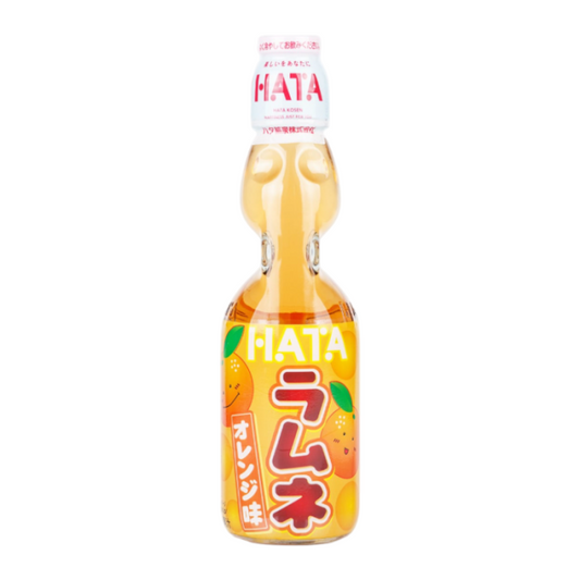 "Hata Ramune Orange in a 200ml glass bottle, offering a sweet and fizzy orange flavor with the signature marble in the bottle neck for a fun, refreshing drink."