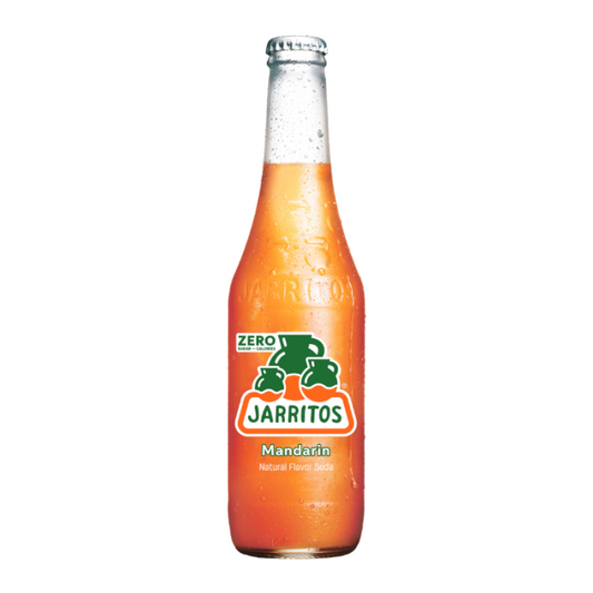 Close-up of Jarritos Zero Mandarin soda bottle on a white background, showcasing bright orange label and carbonation.
