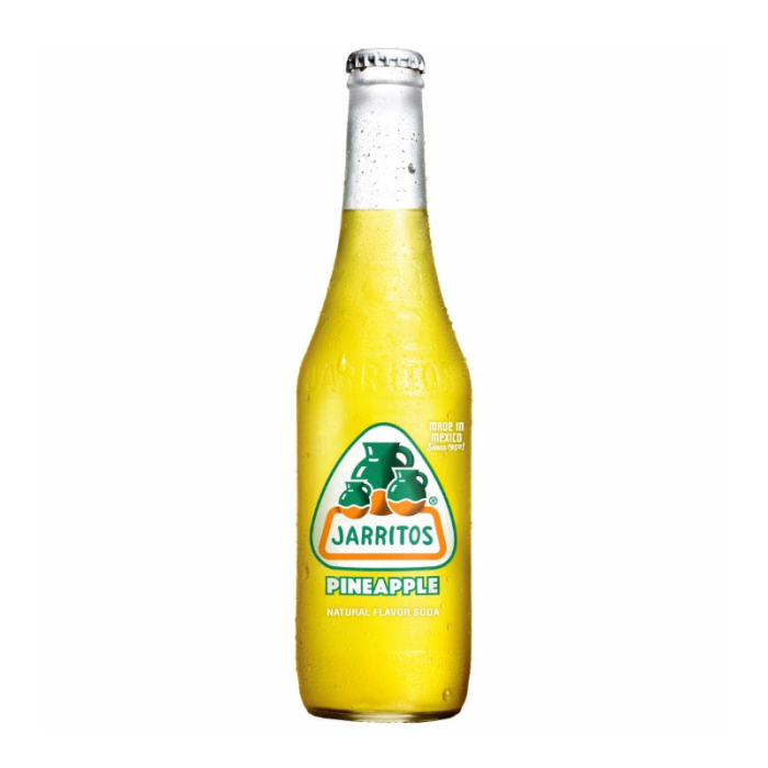 Glass bottle of Jarritos Pineapple Soda 12.5 fl. oz (370 ml) featuring a bright yellow beverage and a label with Jarritos logo and pineapple graphics