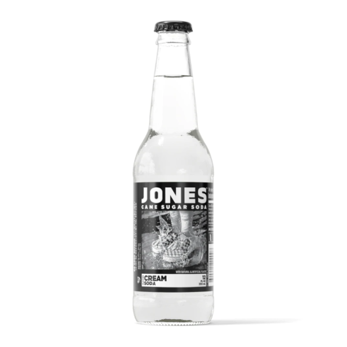 Jones Cream Soda bottle 12 fl. oz 355 ml with lightly golden liquid and distinctive label