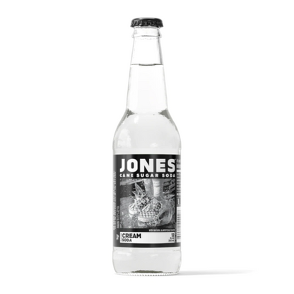 Jones Cream Soda bottle 12 fl. oz 355 ml with lightly golden liquid and distinctive label