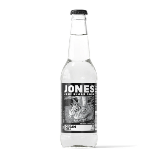 Jones Cream Soda bottle 12 fl. oz 355 ml with lightly golden liquid and distinctive label