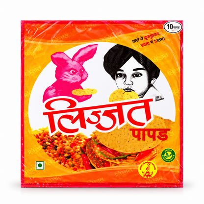 Lijjat Zeera Pappadoms packet featuring orange and yellow packaging with the iconic pink rabbit and girl illustration.