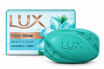 LUX Fresh Glow Soap 130g in pale aqua packaging with a turquoise soap bar featuring floral details.