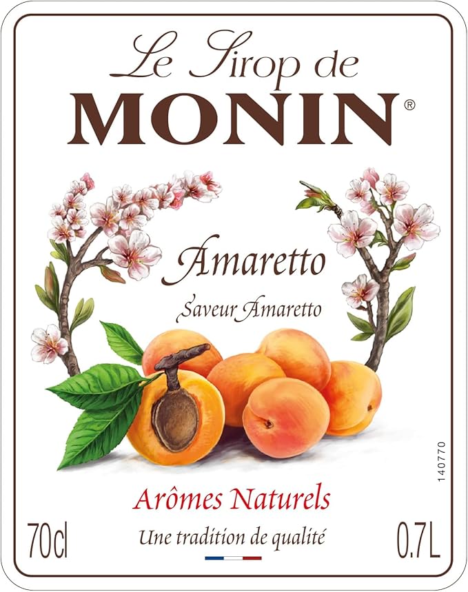 700ml bottle of Monin Amaretto Syrup, made with 100% natural flavors, ideal for vegan and allergen-free drinks.