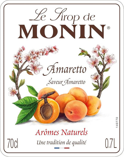 700ml bottle of Monin Amaretto Syrup, made with 100% natural flavors, ideal for vegan and allergen-free drinks.