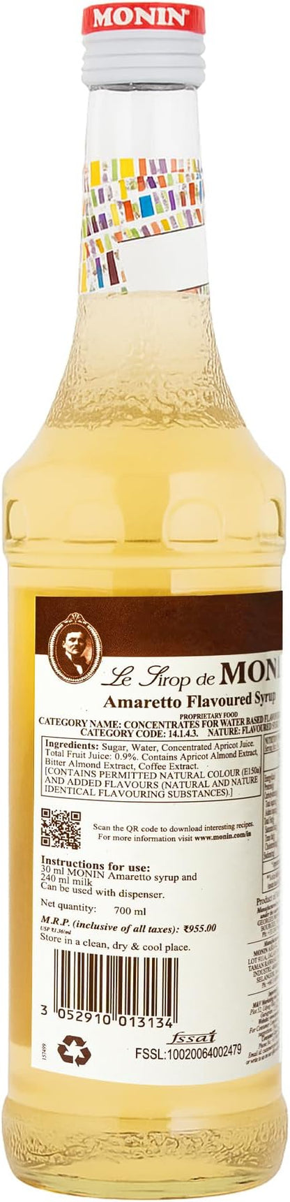 700ml bottle of Monin Amaretto Syrup, made with 100% natural flavors, ideal for vegan and allergen-free drinks.