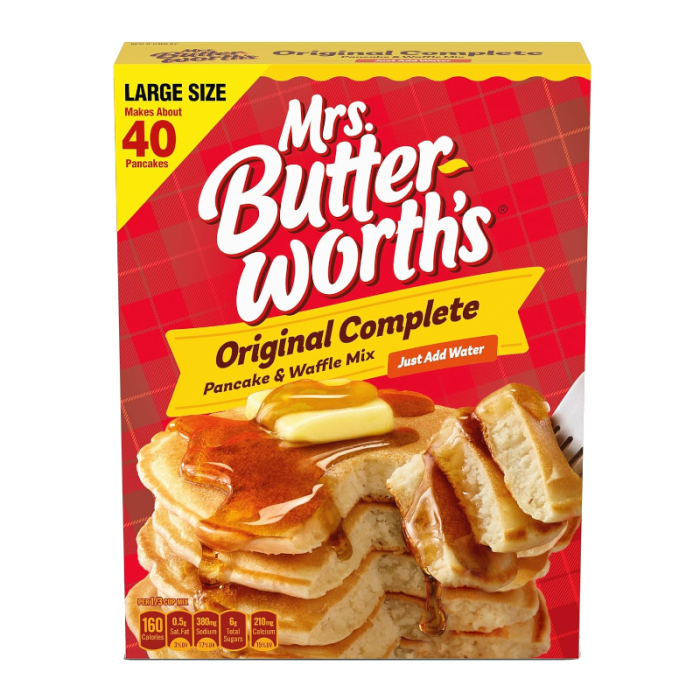 Box of Mrs. Butterworth's Original Complete Pancake and Waffle Mix (32oz/907g), featuring easy-to-make pancakes and waffles with a rich, buttery flavor.