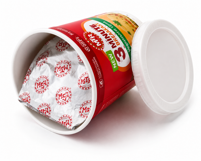 Open MTR 3 Minute Breakfast Vegetable Upma cup showing the sealed inner foil and removable lid on a white background.