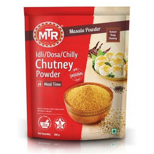 Front view of MTR Masala Powder Idli/Dosa/Chilly Chutney Powder (Original) 200g pack, red and beige packaging with a bowl of yellow chutney powder and images of idli, dried red chilies, and spices on the front.