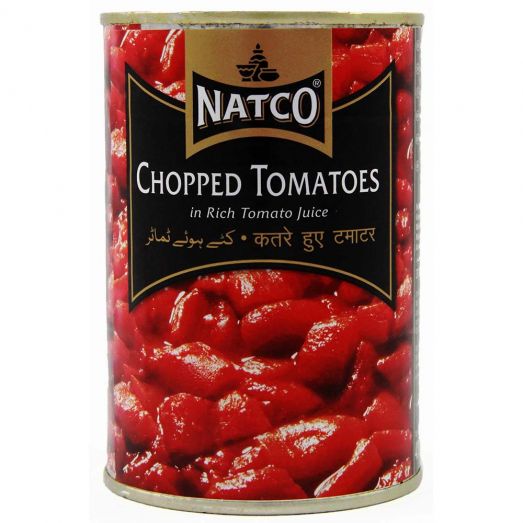 Natco Chopped Tomatoes 400g can in rich tomato juice with black and gold label and image of red chopped tomatoes on the front.