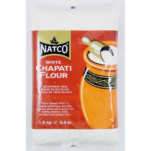 Natco White Chapati Flour 1.5kg bag with red and orange label, Natco logo, and chapati rolling illustration on front packaging.