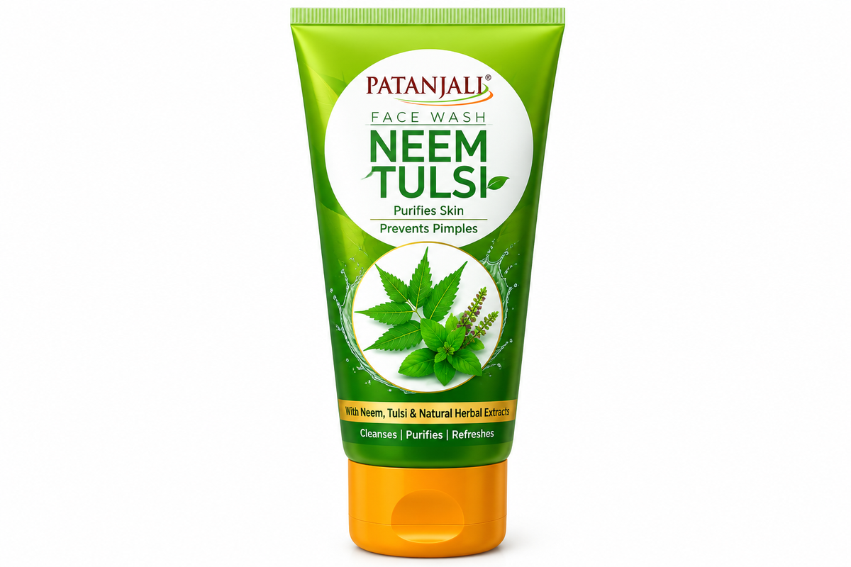 Patanjali Neem Tulsi Face Wash 600g featuring a vibrant green tube with a bright orange flip-top cap, the Patanjali logo, bold Neem Tulsi lettering, and botanical illustrations of fresh neem leaves and tulsi herbs. The packaging highlights the herbal face wash with cleansing and skin-purifying benefits. Displayed upright against a clean white background, showcasing Patanjali Ayurvedic neem and tulsi face wash for everyday facial cleansing and skincare.Patanjali Neem Tulsi Face Wash 600g featuring a vibrant 