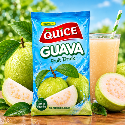 Quice Guava Fruit Drink pouch beside a glass of chilled pale green guava drink with ice, fresh guava halves and green leaves.