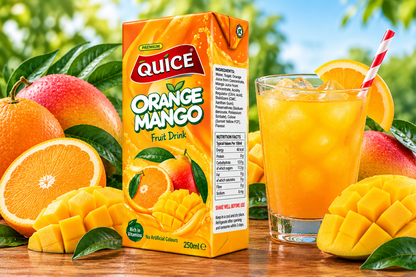 Quice Orange Mango Fruit Drink 250ml carton beside a glass of chilled orange mango beverage with ice, fresh orange slices, mango pieces and green leaves.