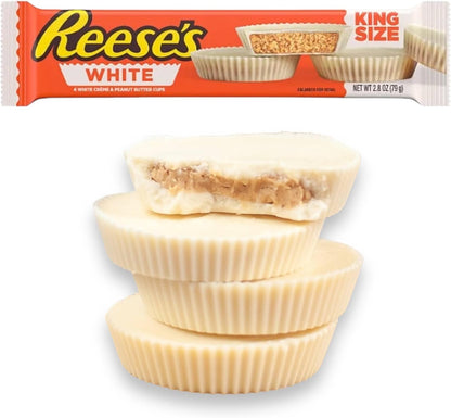 Reese’s White Chocolate Peanut Butter Cups King Size packaging shown above stacked white creme peanut butter cups, with one cup cut in half to reveal creamy peanut butter filling inside.