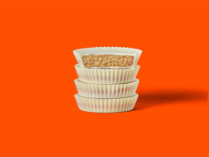 Close-up of Reese’s White Peanut Butter Cups chocolate coating and filling