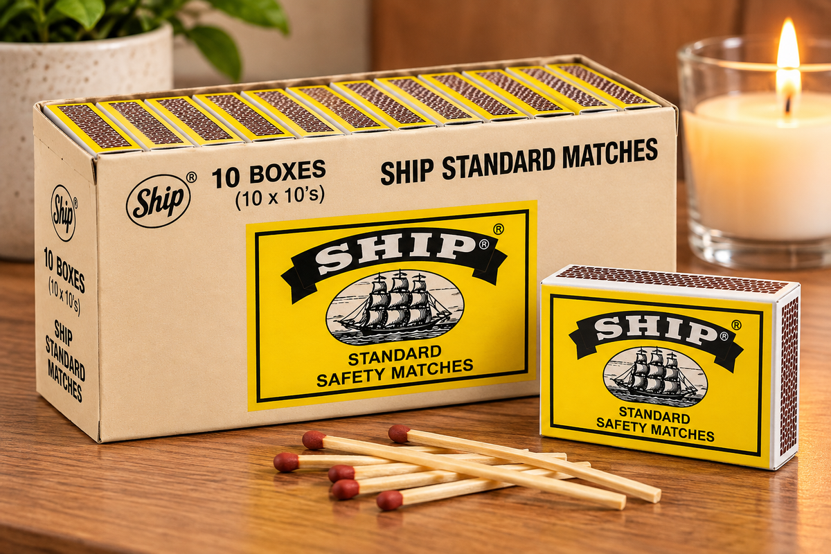 Ship Standard Safety Matches in yellow and black packaging with wooden matches on a warm kitchen tabletop