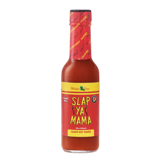 Slap Ya Mama Cajun Hot Sauce adding bold heat to wings, seafood, and soups