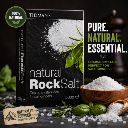 Premium lifestyle image of Tidman's Natural Rock Salt showcasing natural coarse salt crystals with fresh herbs and rustic kitchen styling, perfect for seasoning and salt grinders.